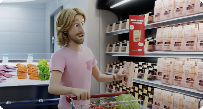 Client examinant un produit Révélations lors de son épicerie chez IGA.